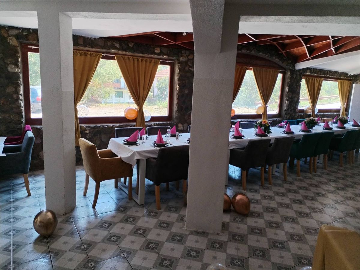 Set tables in the large hall